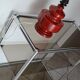 Console/étagère sur pied en acier chromé et verre fumé