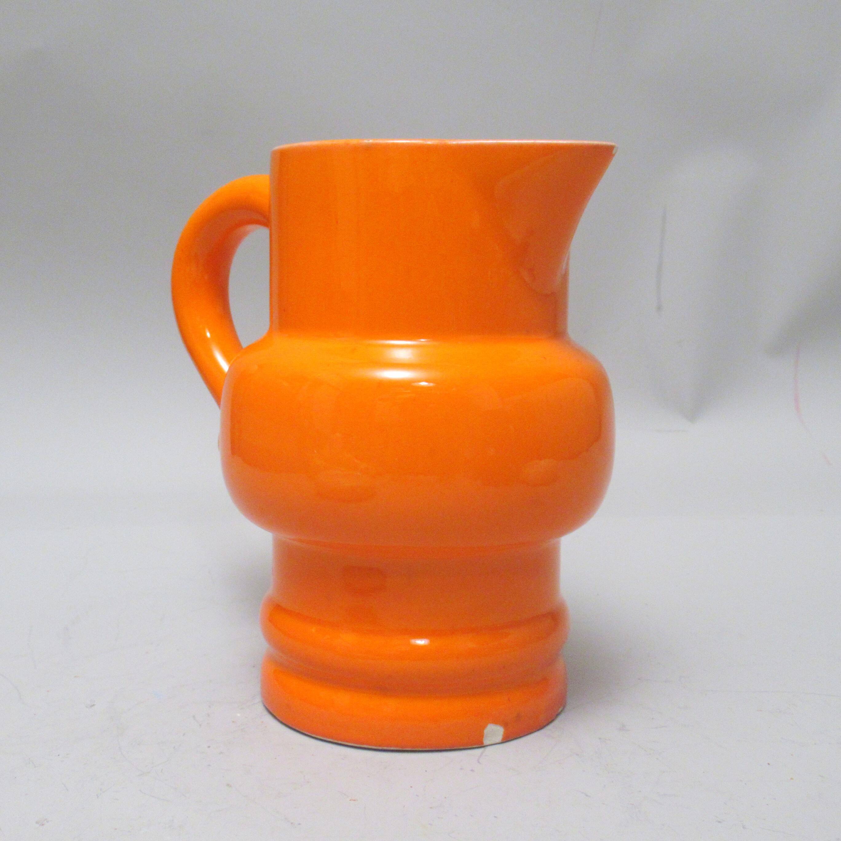 Pichet orange St Clément années 60