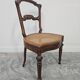 Set of 6 antique dining chairs in solid walnut, cane seats, 19th century.