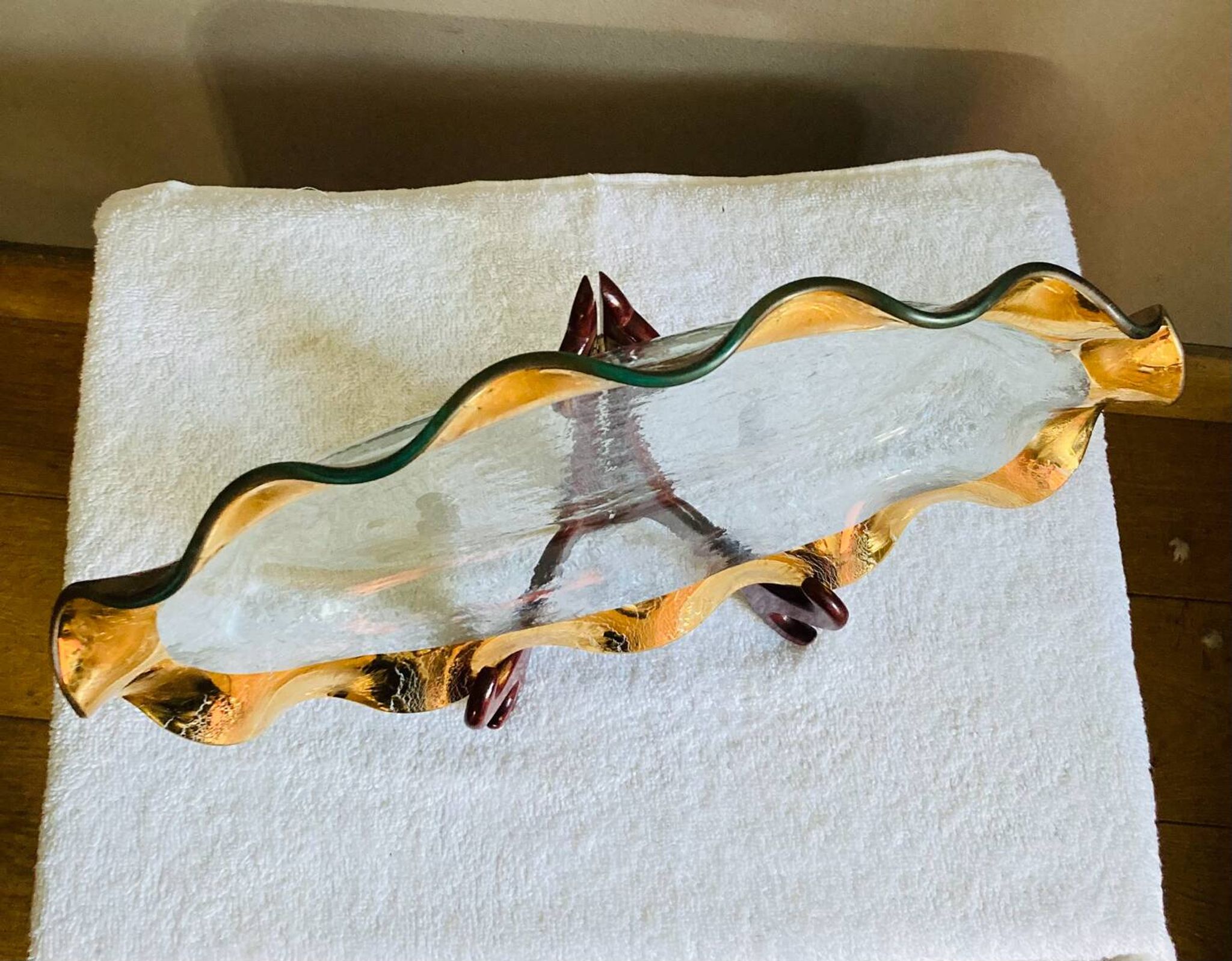 Oval dish signed Annie Glass 38/35 made in the USA wavy edge gilded with fine gold