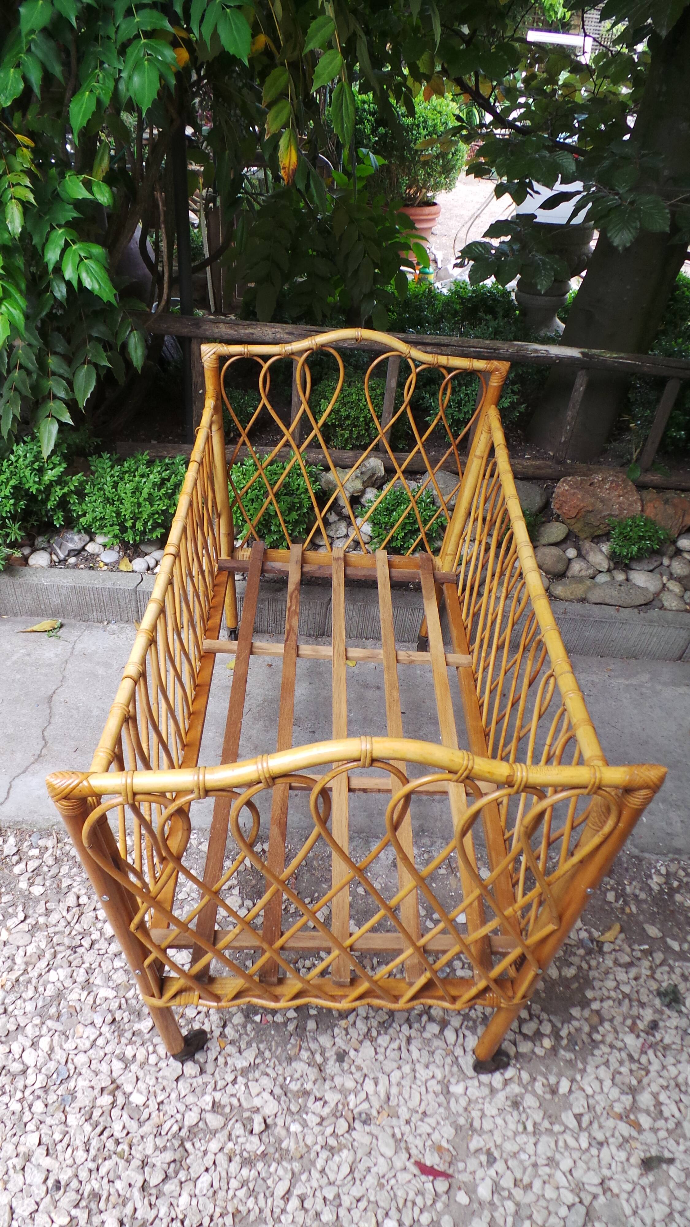 Rattan crib of the 50s