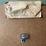 Old large oval wall mirror in golden resin