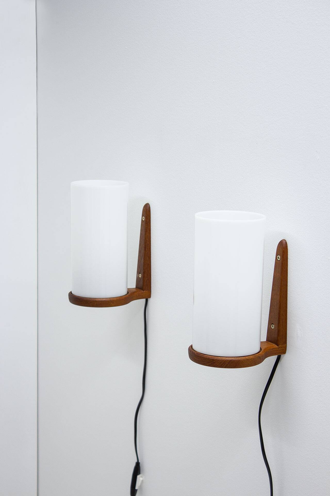 Pair of teak & acrylic sconces by Luxus, Sweden