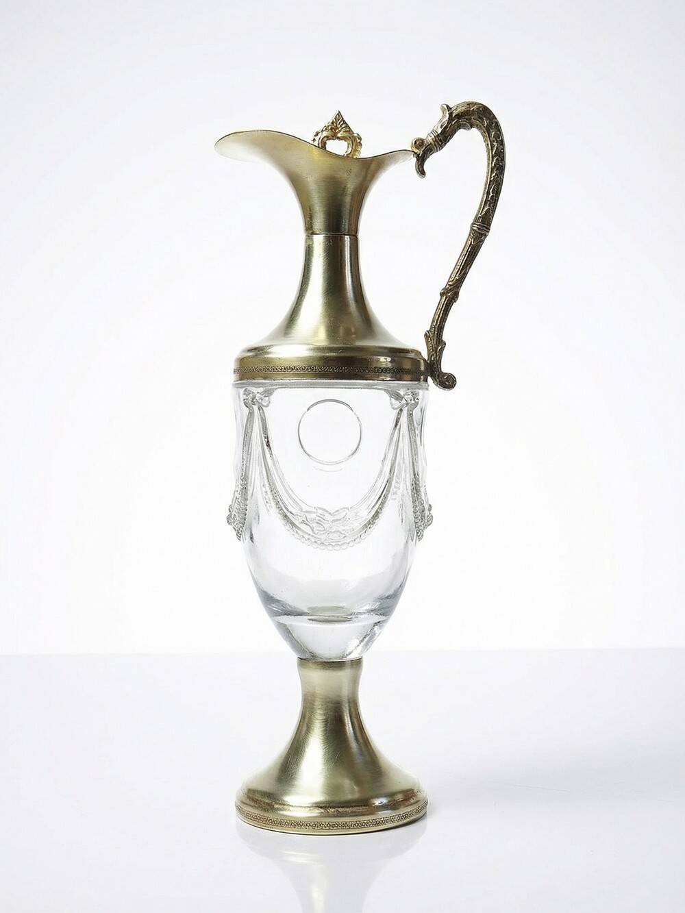 Vintage decorative jug in moulded glass and gilded brass, Italy circa 1980.