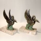 Art Deco bookends with metal swans, double patina and marble base.