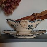 Old gravy boat on frame in terre de fer earthenware by gien, “chardons” model in blue-green