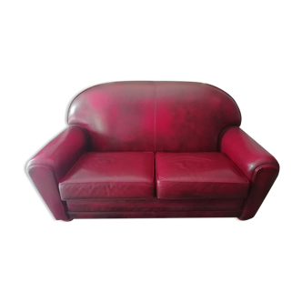 Patinated red club sofa