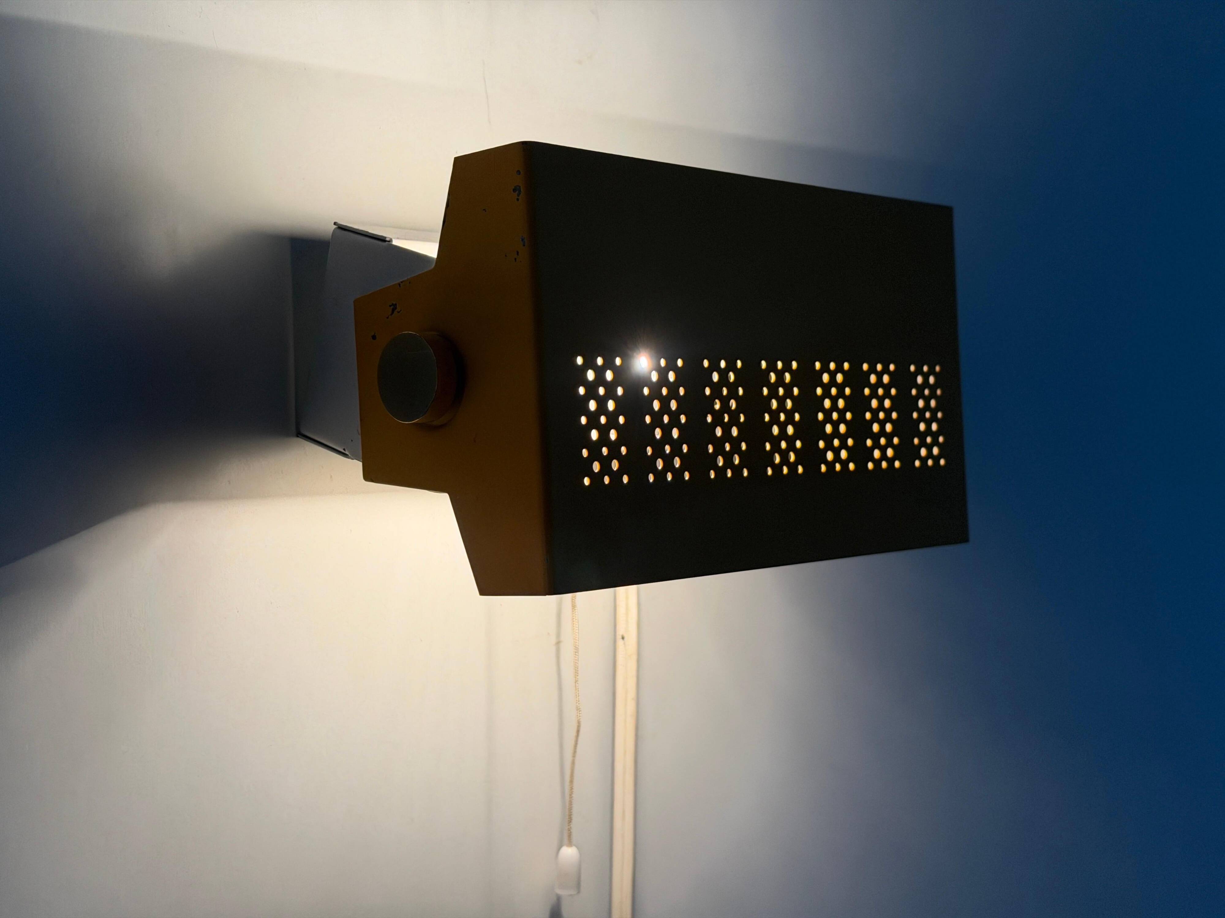 Pair of yellow metal wall lights from the mid-century by N Leuchten, 1960s, Germany.
