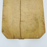 Small and old wooden cutting board. Year 50