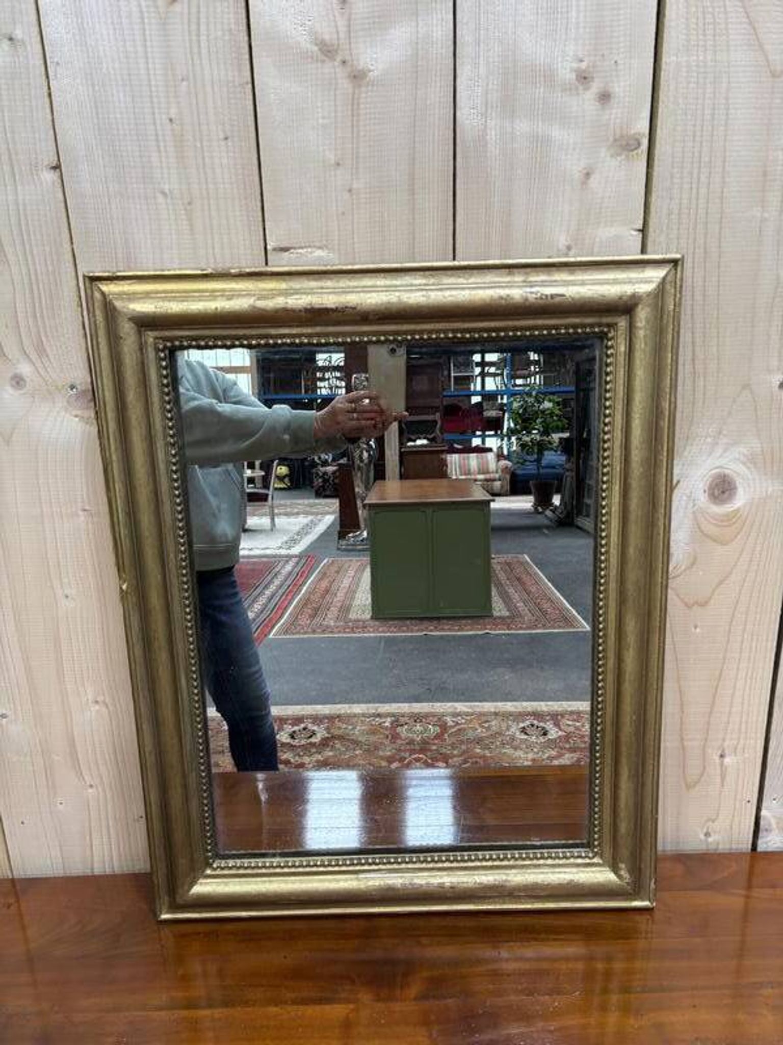 Miroir doré de style Louis XVI