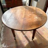 Round drop-leaf table