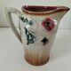Moulded slip pitcher - late 19th century - Floral decoration in relief