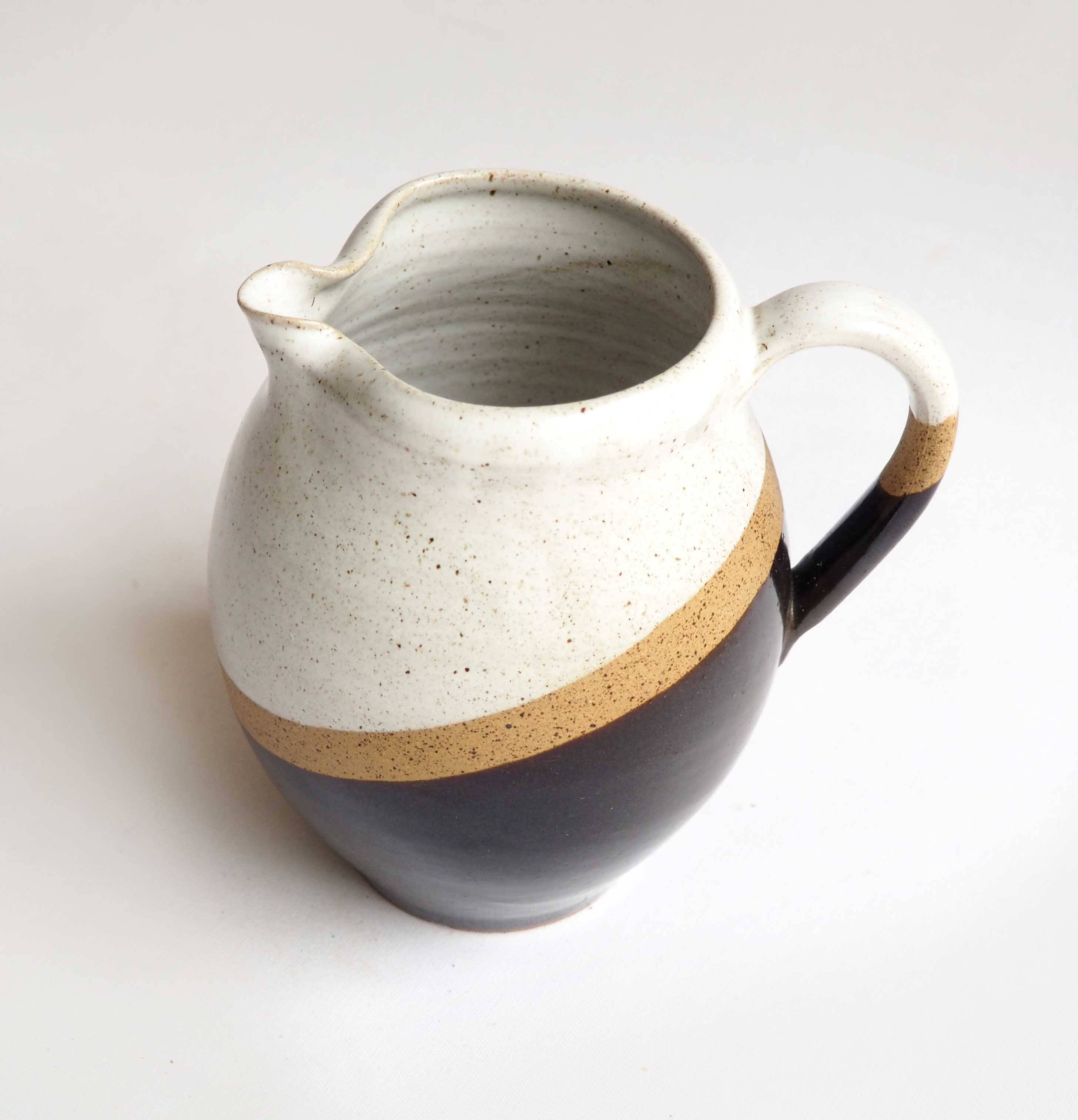 Tricolor stoneware pitcher