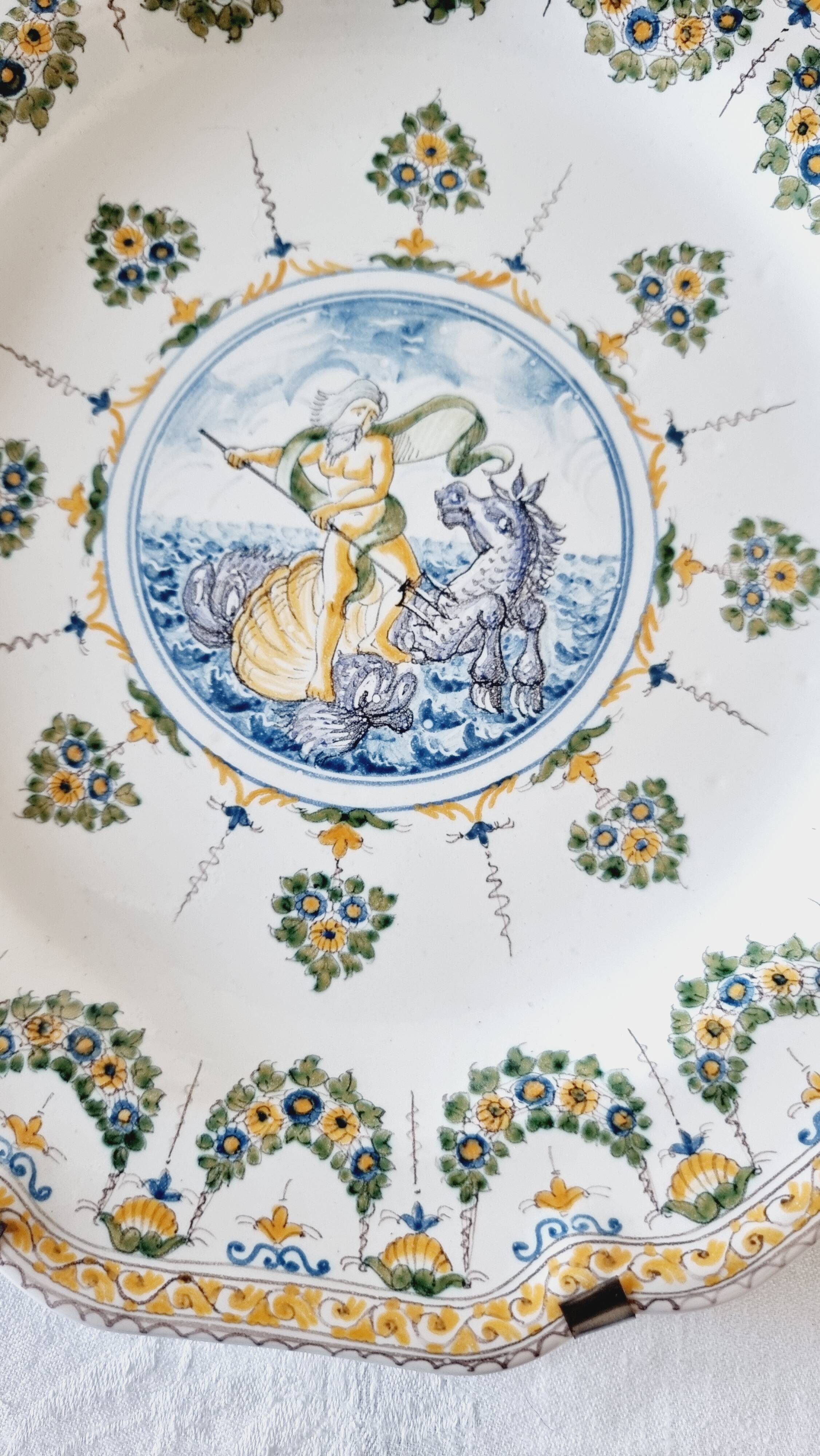 Antique plate in Moustiers faience, hand-painted, decorated with an s