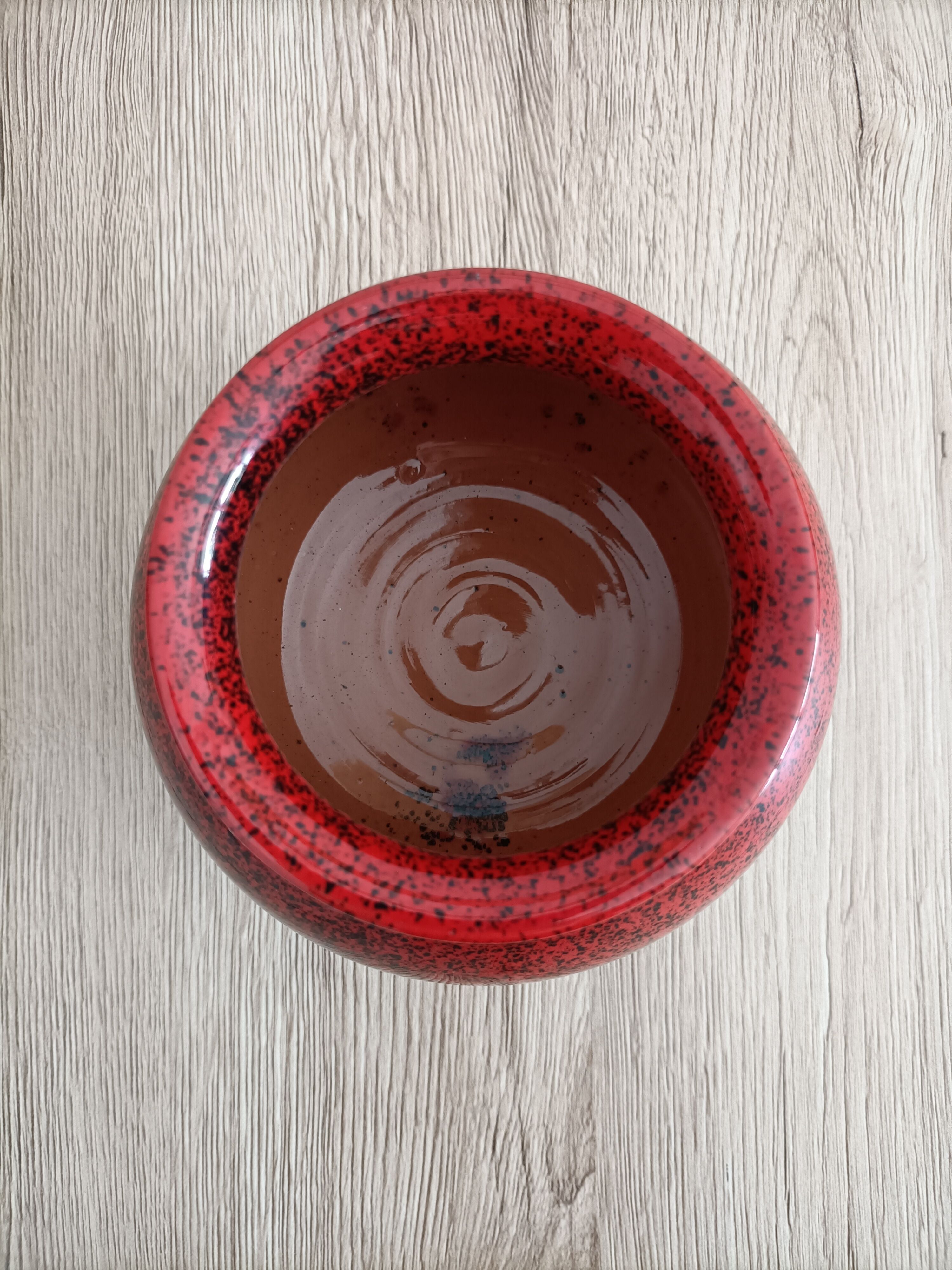 Red and black ceramic vase or pot cover