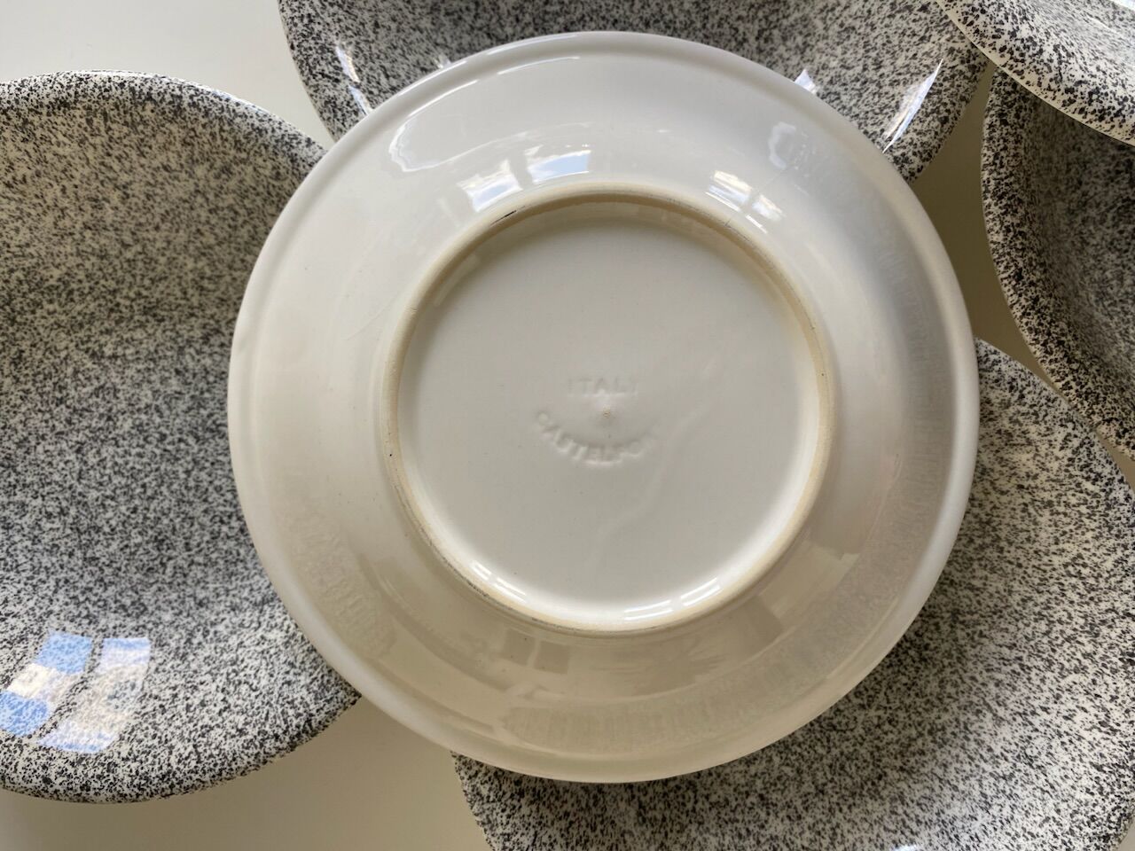 Set of 8 hollow plates in Italian speckled ceramic