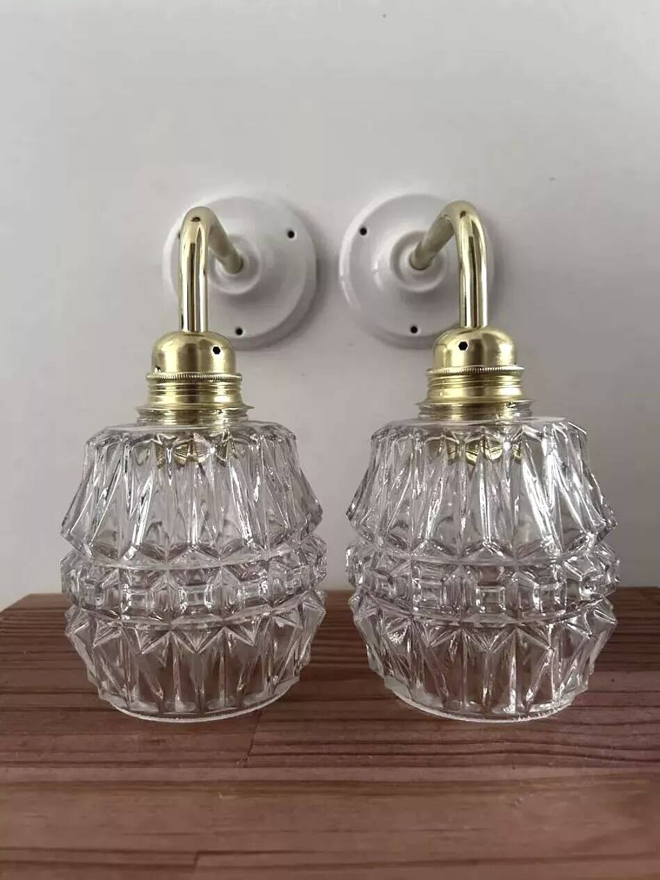 Pair of ceramic and glass wall sconces