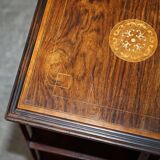 Edwardian revolving bookcase in hardwood with Sheraton inlay.