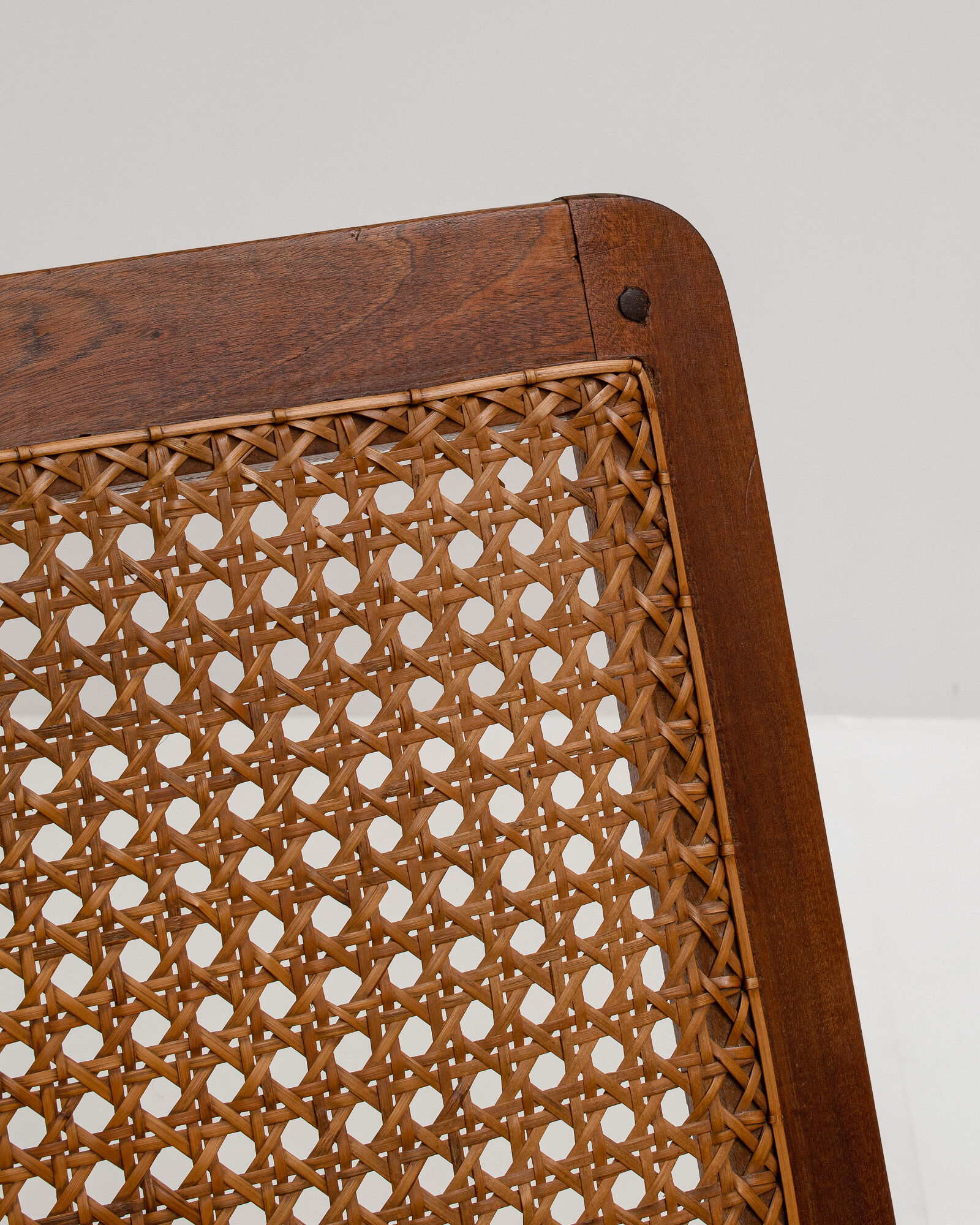 pair of french mahogany and cane armchairs, 1950s