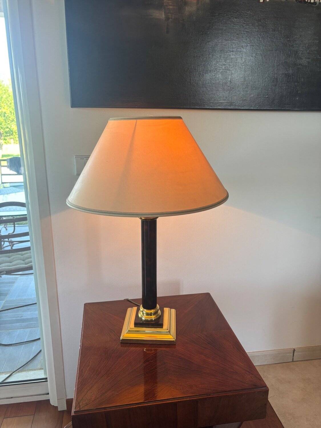 Empire style table lamp, gilded brass and black lacquered.