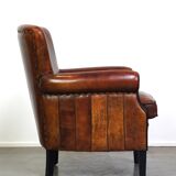 sheepskin armchair with a beautiful finish and deep color