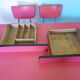 Table in red formica, 4 roc chairs, 2 extension cords, 2 drawers 60