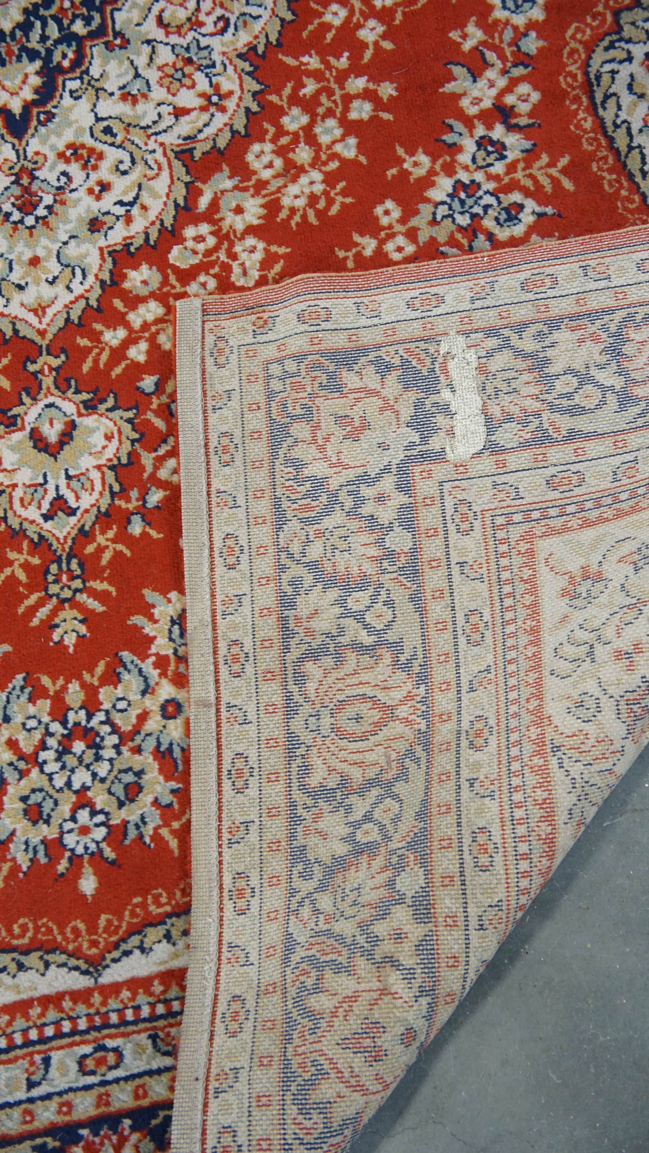 Vintage oriental rug in predominantly red/beige tones with a stunning pattern, 236x170 cm
