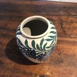 Ceramic vase with floral decorations