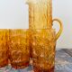 Orangeade service in amber glass 8 glasses and their pitcher
