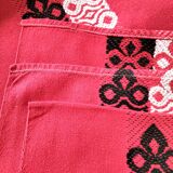 Vintage graphic red tablecloth and 8 matching napkins.