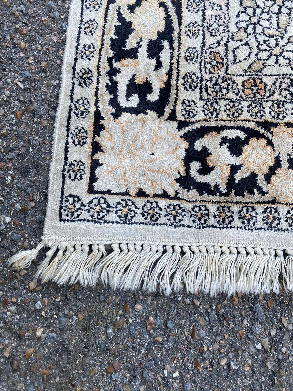 Handmade beige wool Persian rug 130x200