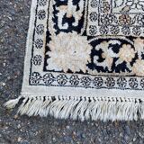 Handmade beige wool Persian rug 130x200