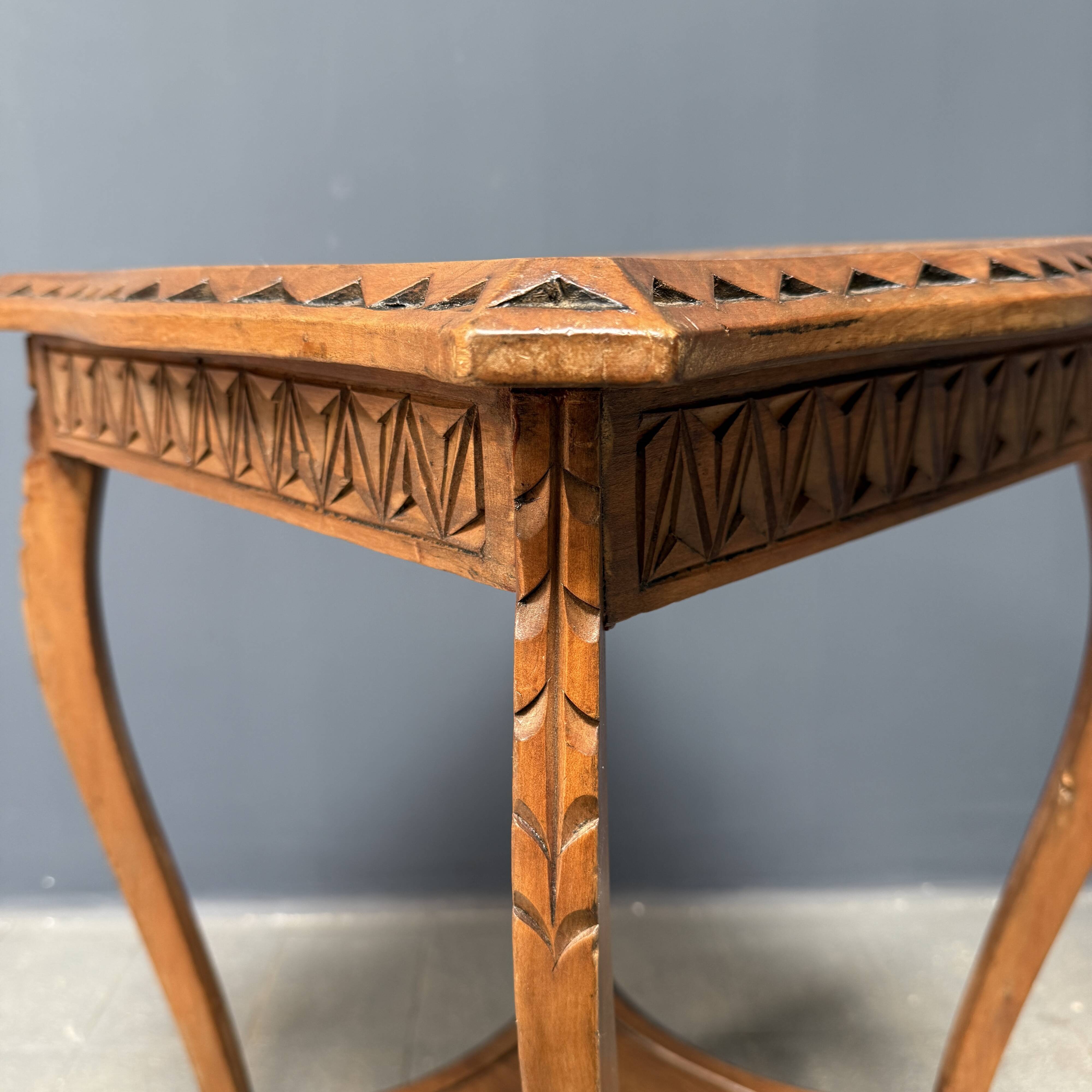 Graceful antique carved wooden side table