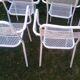 Set of 4 stackable perforated garden armchairs
