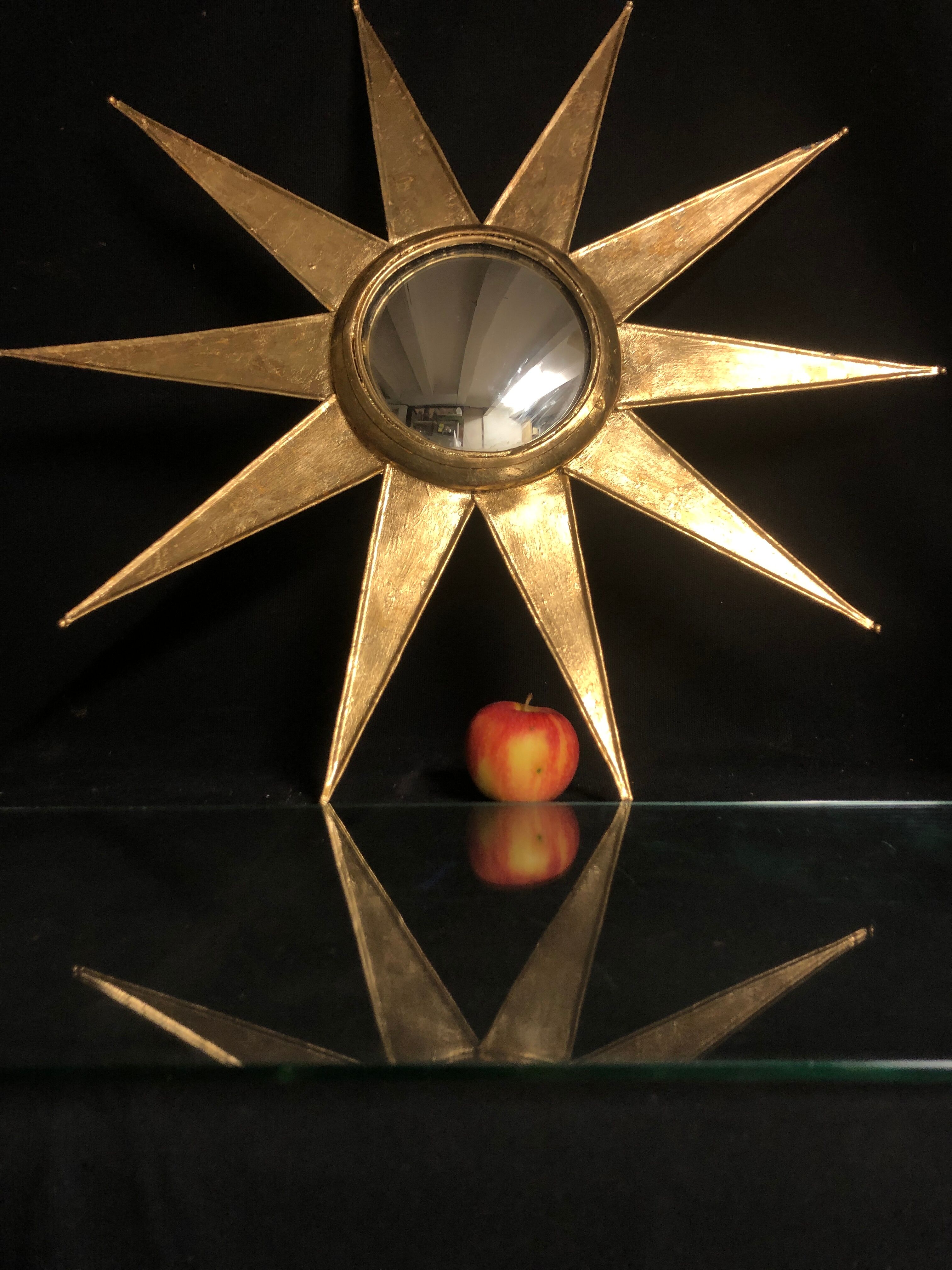 Mirror sun deforming 61 cm in gold metal with gold leaf said witch