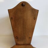 Vintage magazine rack in wood and caning, 50s