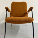 Vintage orange boucle armchair, French design from the 1950s.