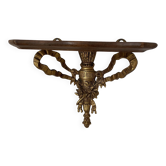 baroque shelf in wood and bronze ribbon