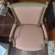Patinated Louis XVI style armchair