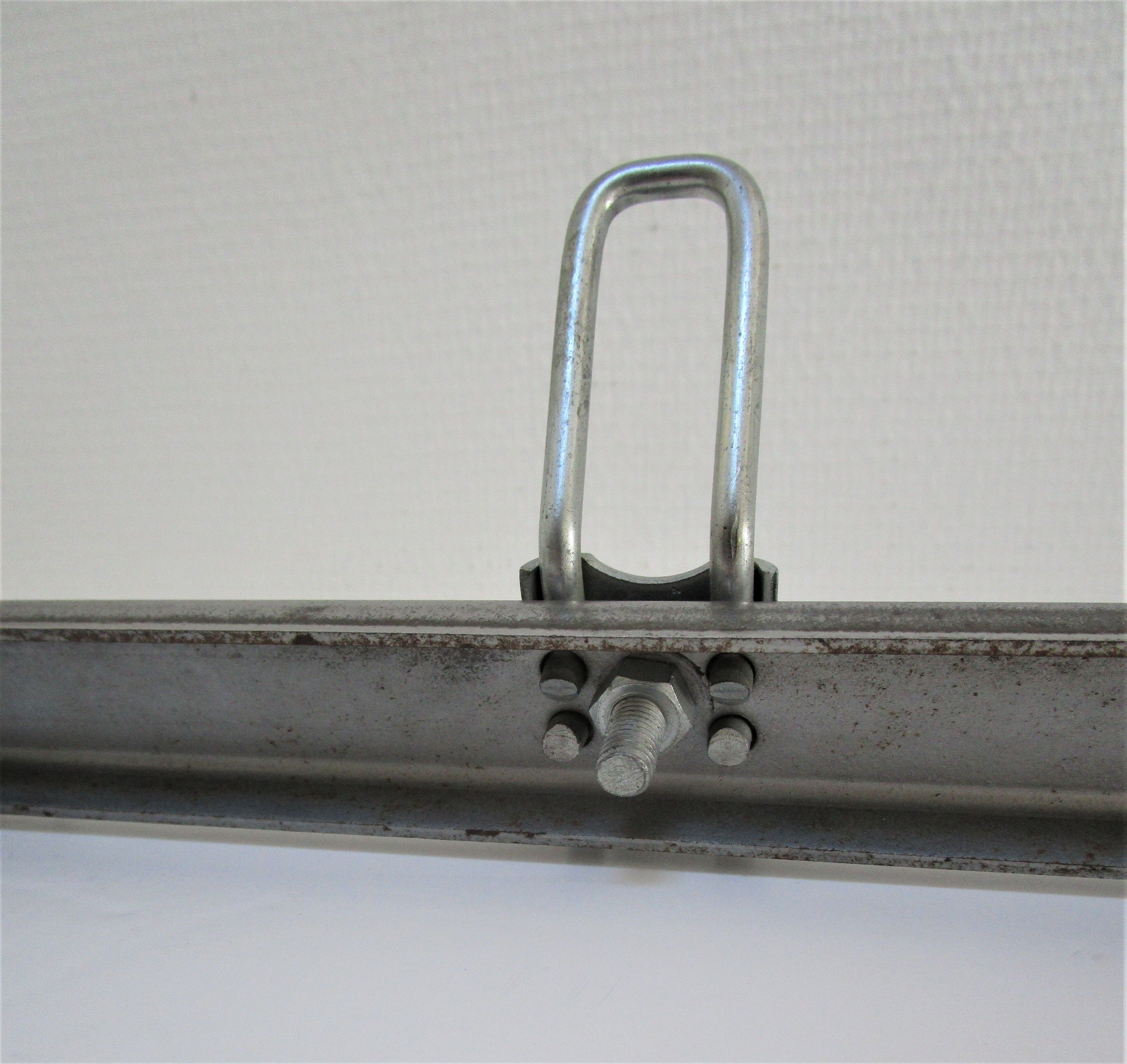 Vintage school wall rack in patinated steel