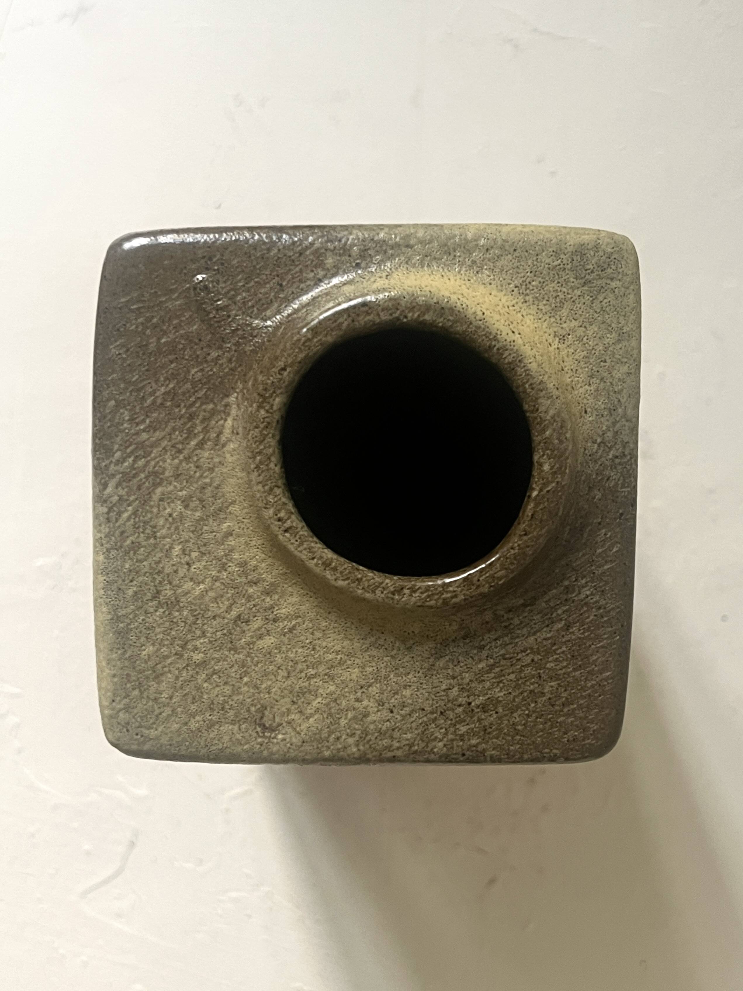 The modernist vase is German, VEB Haldensleben Fat Lava 1970.