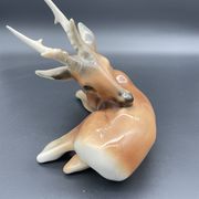 Royal Dux porcelain lying deer – Vintage Bohemian sculpture, model