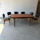 Rectangular extendable table in Scandinavian design made of solid teak.