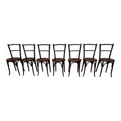 Série de 7 anciennes chaises bistrot Baumann bois courbé assise ronde