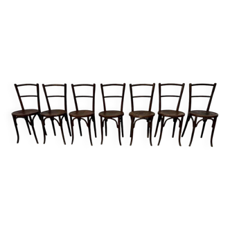 Série de 7 anciennes chaises bistrot Baumann bois courbé assise ronde