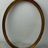 Old oval shaped wooden frame