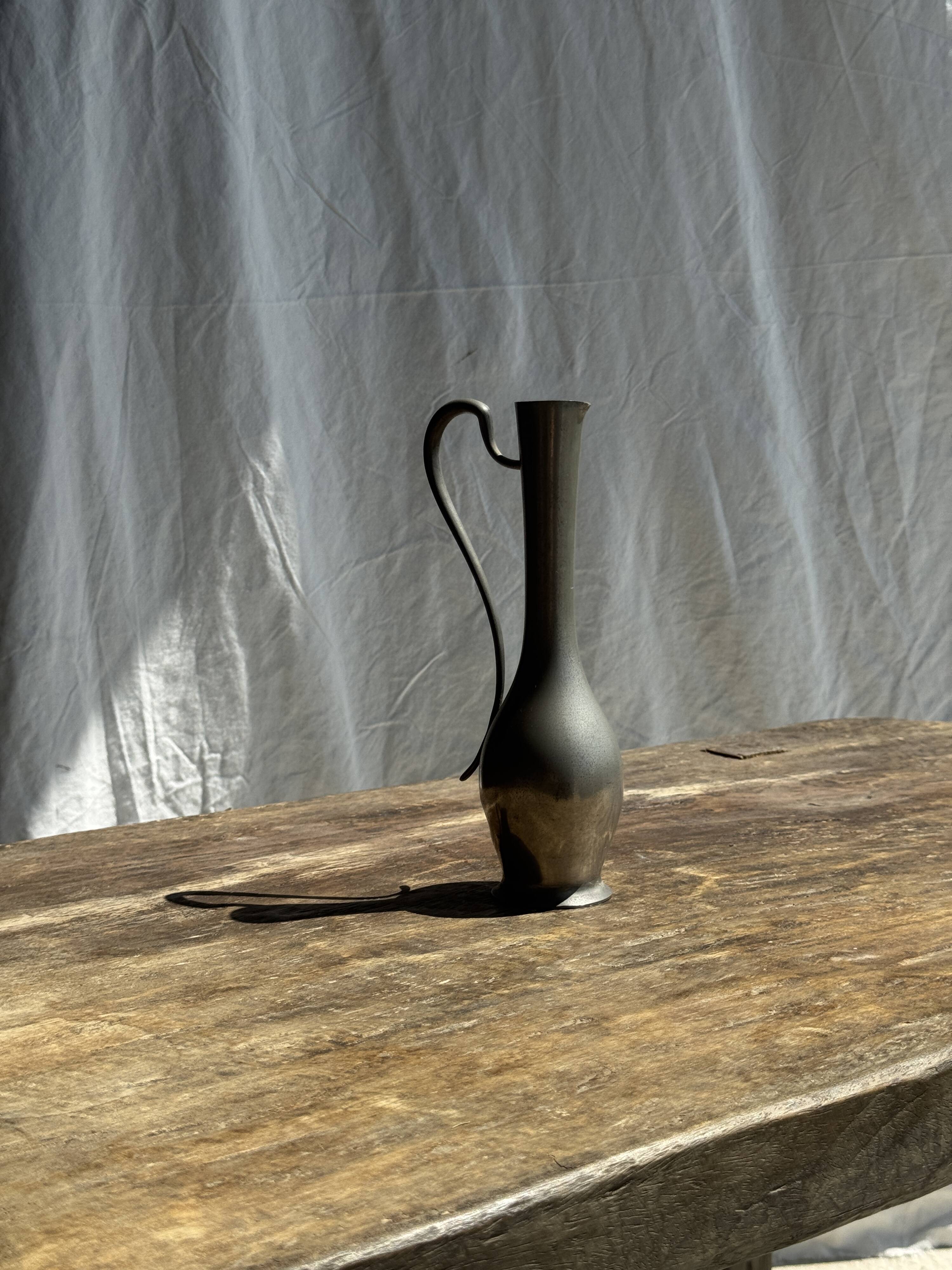 Small 19th century pewter jug, 95% hallmark H20.5