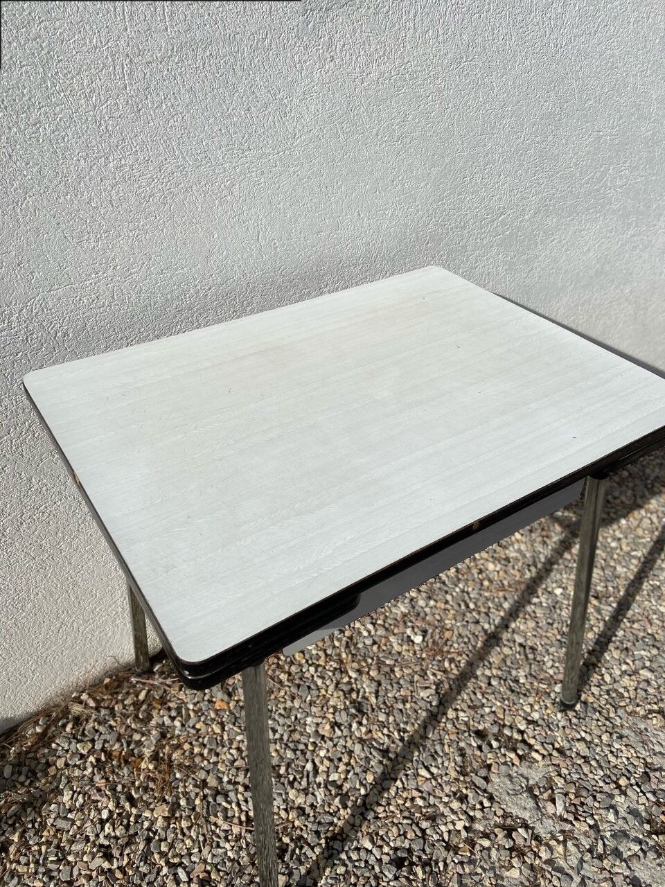 White formica table with chair