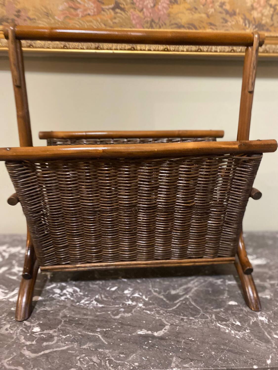Wicker and brown wood magazine rack