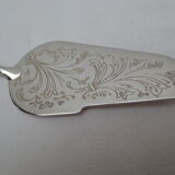 shovel and clamp with antique cakes, silver